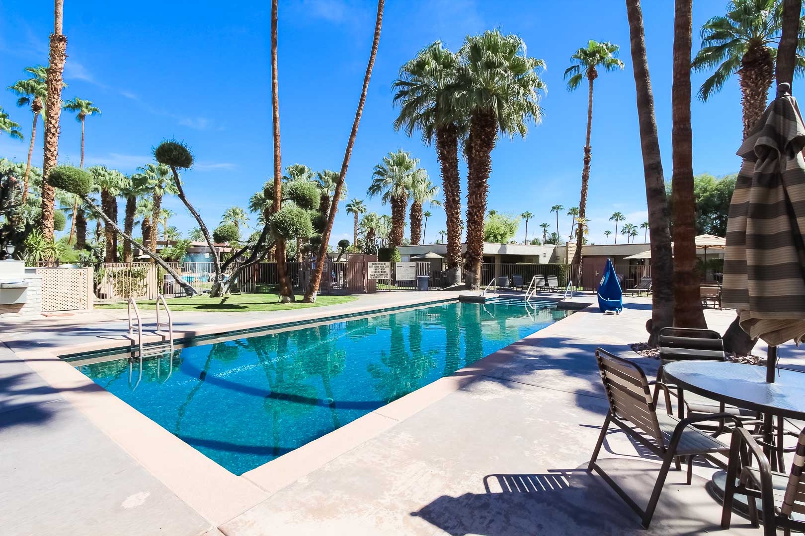 A refreshing outside swimming pool at VRI's Desert Isle Resort in California.